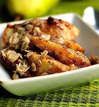 Pear Crisp In a Bowl With Spoon on the side