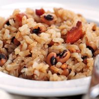 Hoppin John is a traditional southern New Year's Day dish made of black-eyed peas and rice, accented with pork.