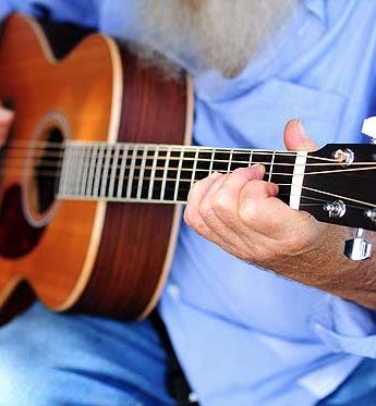 Tobias playing guitar