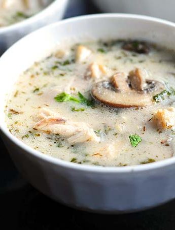 This Thai-inspired Coconut Chicken Soup Recipe makes a wonderful bowl of soup with the flavor combination of ginger, lemongrass, coconut milk and a bit of spice.