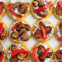 Polenta Pizzas with Goat Cheese Sauteed Mushroom and Peppers Recipe shewearsmanyhats.com
