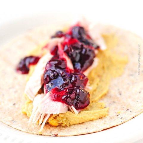 These Rosemary Hummus Turkey Cranberry Wraps are like Thanksgiving dinner all wrapped up in a tasty little package.