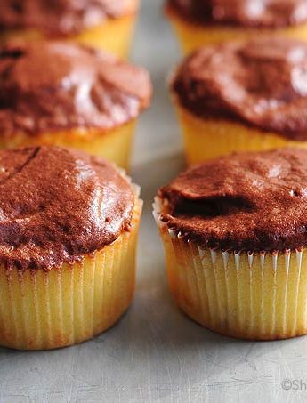 This is the best Yellow Cupcake Recipe. It make a light fluffy cupcake that partners perfectly with a chocolate buttercream.