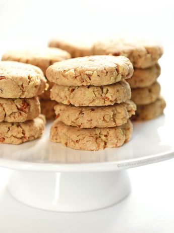 Crunchy, buttery and nutty goodness all mixed together in these Pecan Sandies to make a classic cookie favorite. shewearsmanyhats.com