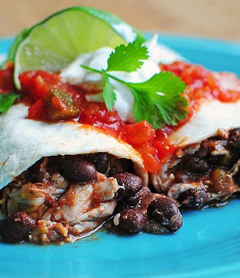 Delicious Easy Chicken and Black Bean Burritos are a tasty choice for a quick lunch or dinner. They're quick to make too!