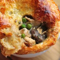 This Chicken Pot Pie recipe is the best kind of savory comfort food, and it's the perfect meal to feed a group.