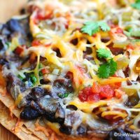 These Mexican Black Bean Pizzas are the perfect for lunch or appetizers and they couldn't be easier to make.