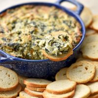 Make a batch of this Spinach Artichoke Dip for your next get together and watch the smiling faces crowd around with a chip in hand.