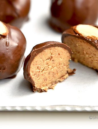 Almond Butter Balls With Chocolate and Almond Shavings on top