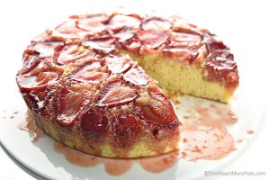 strawberry upside down cake with one slice cut oout