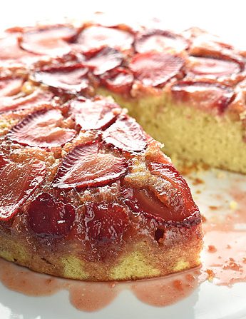 strawberry upside down cake with one slice cut oout